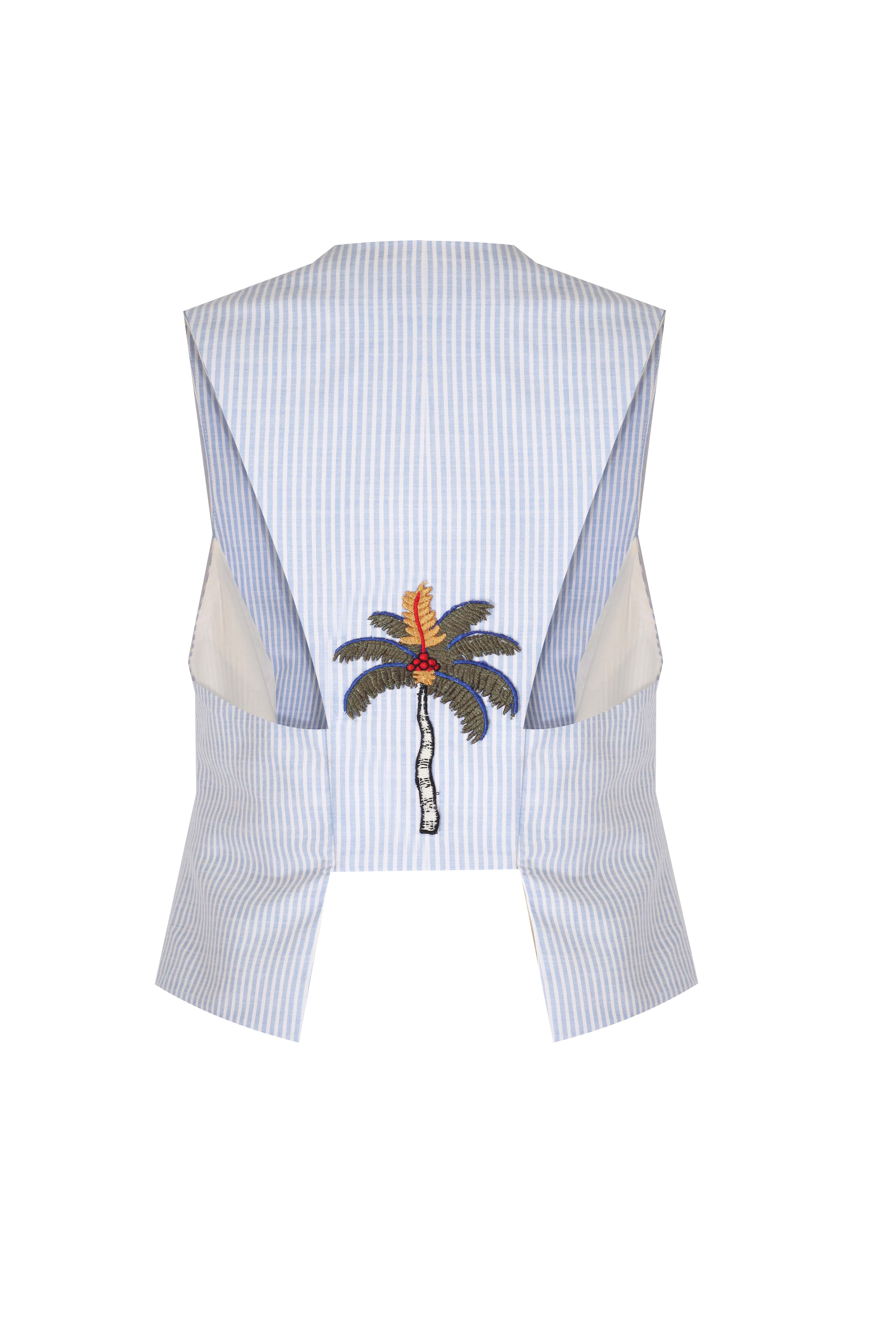 ABBY VEST: Blue striped linen vest with palm tree embroidery on the back, made from sustainable materials.