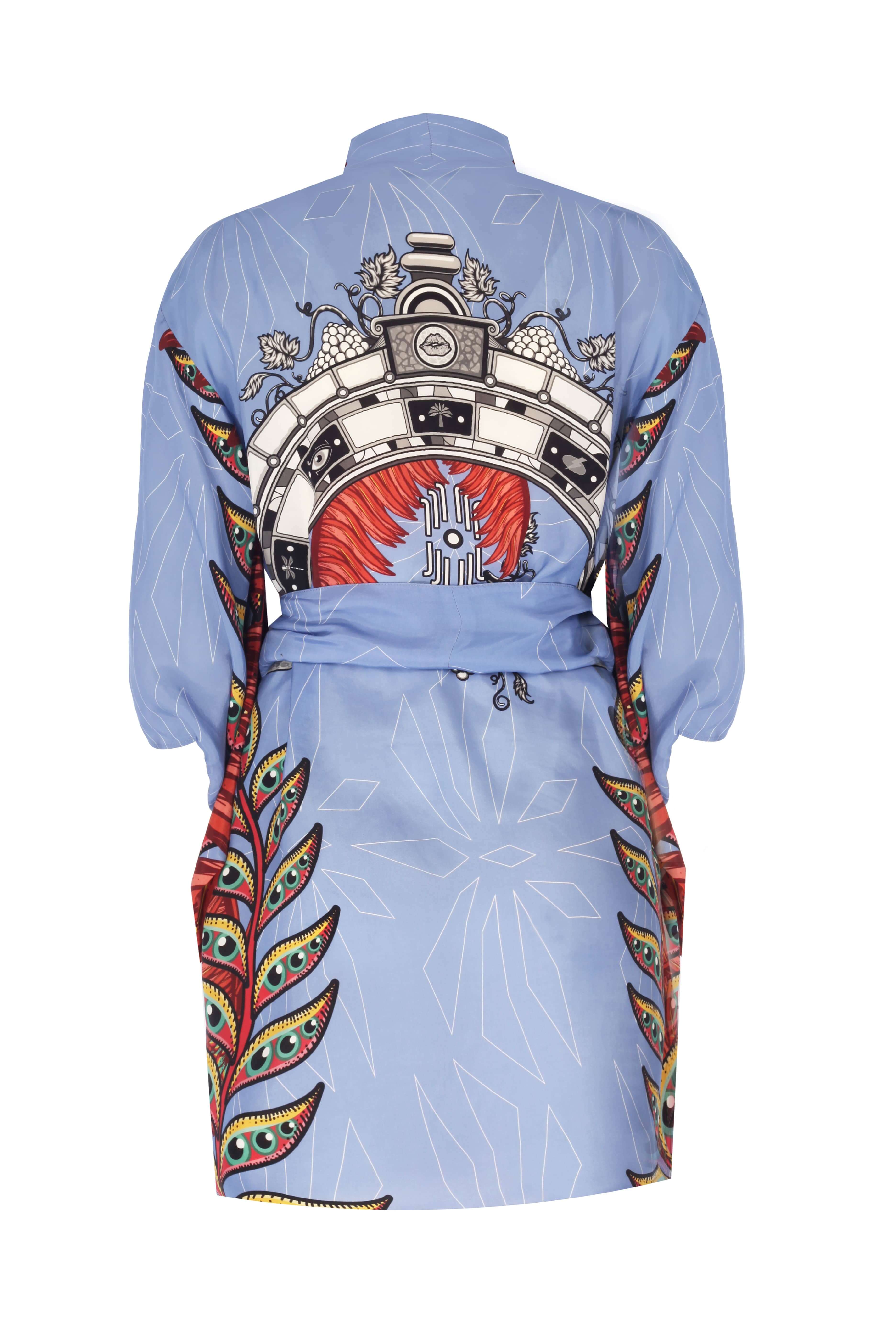 Bria Dress in sustainable cupro material, featuring a vibrant blue design with intricate back patterns, dry clean only.