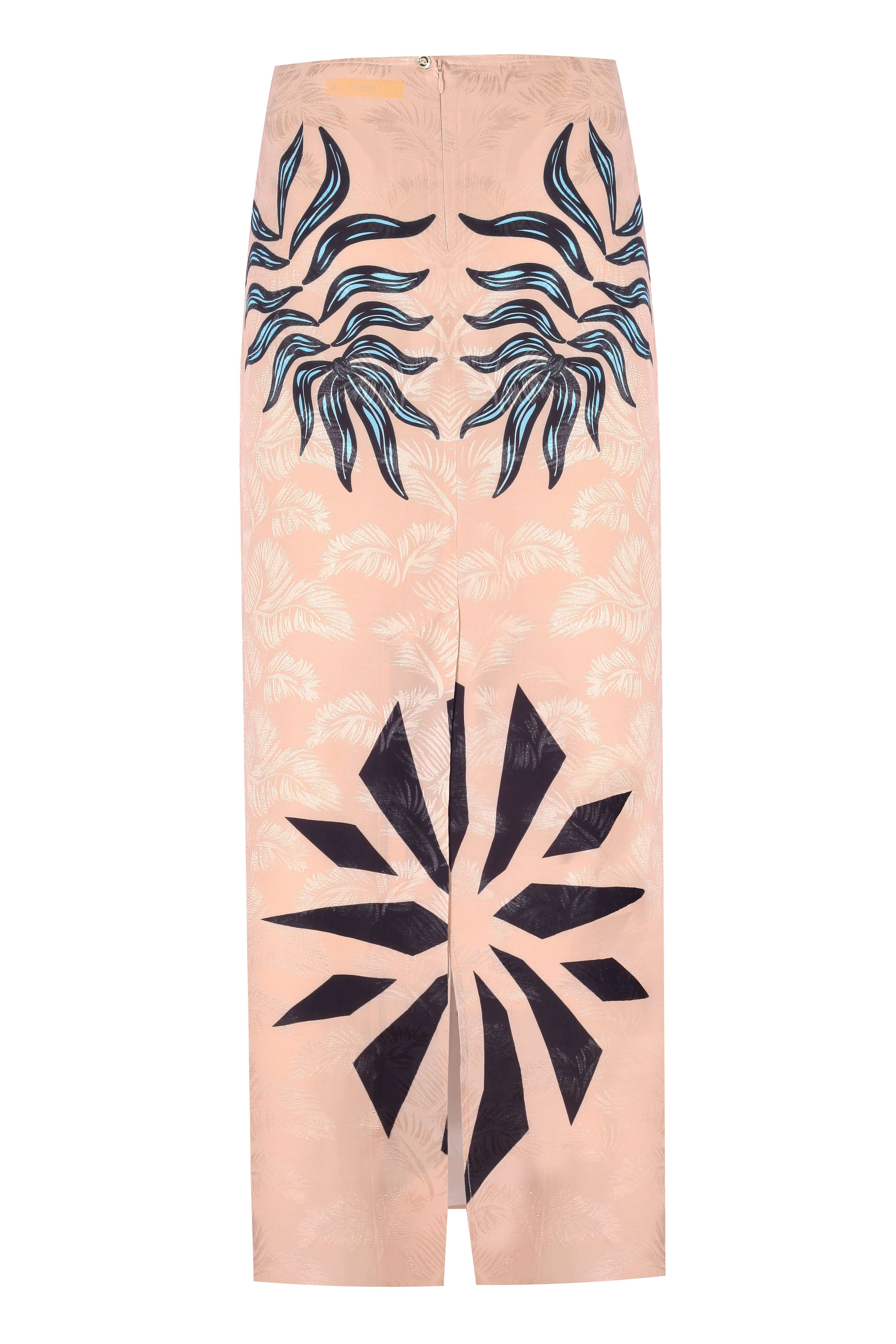 MAXIMA SKIRT in soft pink with intricate leaf patterns and bold abstract designs, perfect for stylish occasions.