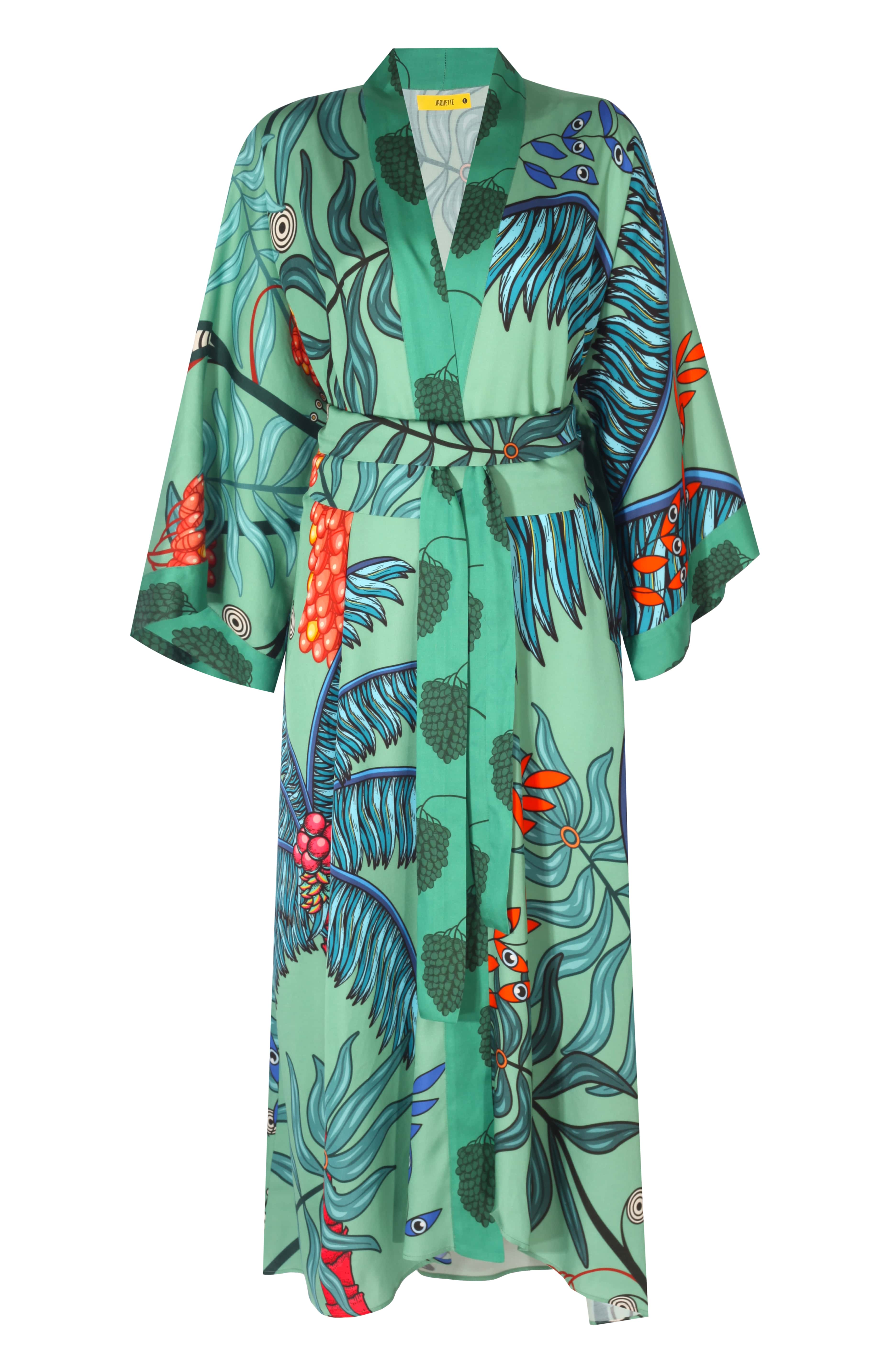 Robina Caftan featuring vibrant tropical print and elegant belt, perfect for stylish summer outings.