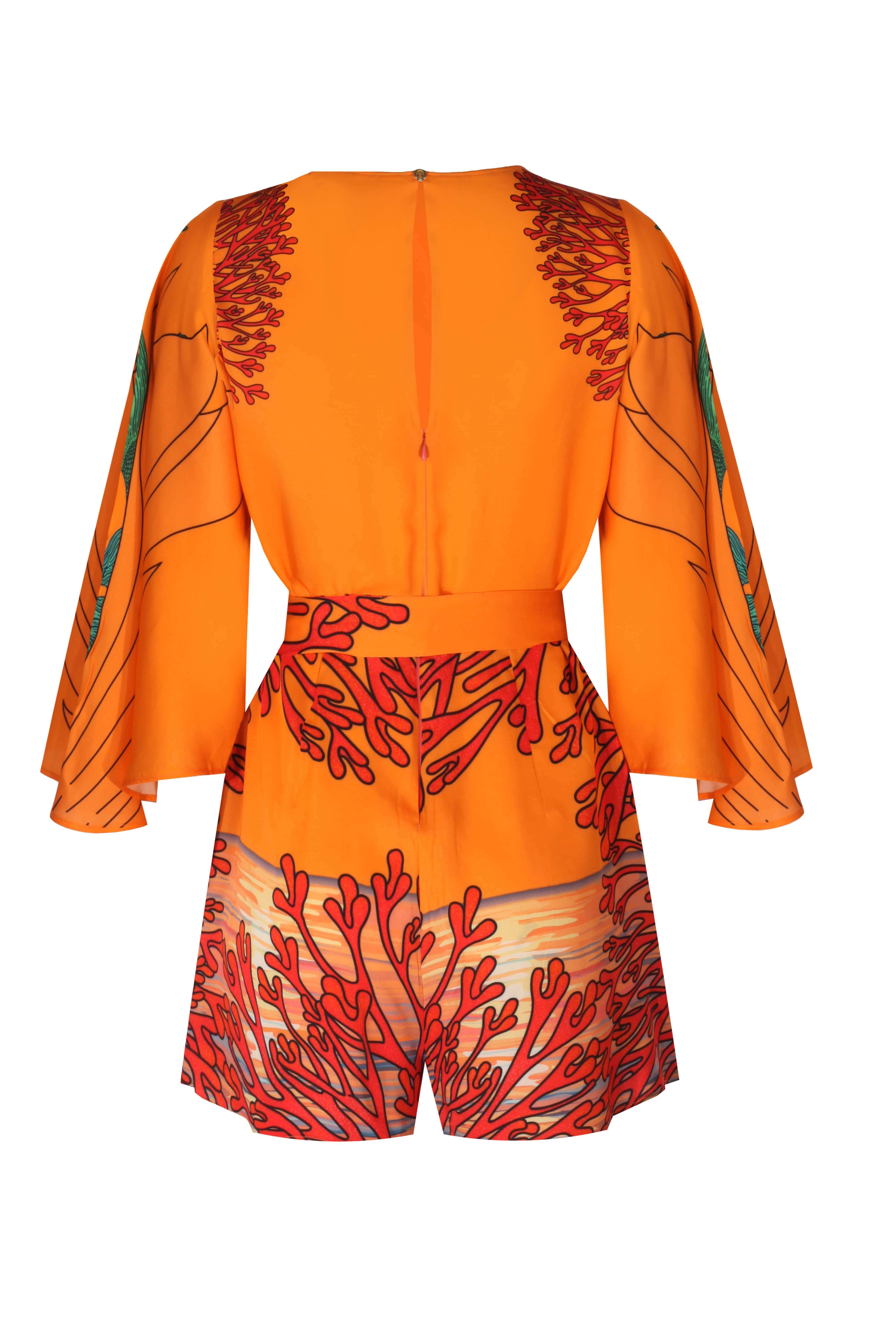 Back view of the vibrant Salma Short Dress featuring floral design and flowing sleeves in bright orange.